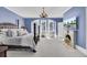 Spacious bedroom with bay windows and a fireplace at 208 Sumter Ave, Summerville, SC 29483