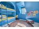 Fun blue bedroom featuring built-in bunks, cheerful rug, and a workspace at 208 Sumter Ave, Summerville, SC 29483