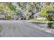 Long driveway leading to charming home and detached garage at 208 Sumter Ave, Summerville, SC 29483