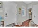 Bright entryway with hardwood floors, modern door, and window at 208 Sumter Ave, Summerville, SC 29483