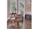 Charming game room with antique chess table and hardwood floors at 208 Sumter Ave, Summerville, SC 29483