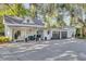 Detached garage and charming guest house with covered porch at 208 Sumter Ave, Summerville, SC 29483
