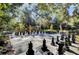 Giant outdoor chessboard surrounded by lush greenery at 208 Sumter Ave, Summerville, SC 29483
