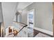 Upper hallway with hardwood floors and bedroom access at 208 Sumter Ave, Summerville, SC 29483