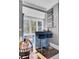 Well-appointed home bar with unique liquor signage and bar cart at 208 Sumter Ave, Summerville, SC 29483