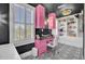 Bright office boasts pink cabinetry, built-ins, and patterned floors at 208 Sumter Ave, Summerville, SC 29483