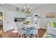 Charming kitchen and dining area with light-colored cabinets and a round dining table at 208 Sumter Ave, Summerville, SC 29483