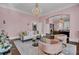 Bright living room with a white sofa and two armchairs at 208 Sumter Ave, Summerville, SC 29483