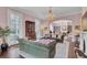 Elegant living room featuring plush sofas and a grand chandelier at 208 Sumter Ave, Summerville, SC 29483