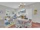Bright and airy living room and dining area with hardwood floors and coastal decor at 208 Sumter Ave, Summerville, SC 29483