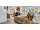 Spacious main bedroom with a comfy bed and sitting area at 208 Sumter Ave, Summerville, SC 29483