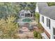 Aerial view of kidney-shaped pool, patio, and guest house at 208 Sumter Ave, Summerville, SC 29483