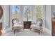 Sitting area with two armchairs and a decorative table at 208 Sumter Ave, Summerville, SC 29483