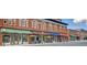 Charming storefronts with awnings in a historic downtown area at 208 Sumter Ave, Summerville, SC 29483