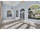 Bright sunroom with arched windows and tile flooring at 208 Sumter Ave, Summerville, SC 29483