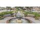 Picturesque town square fountain with benches and landscaping at 208 Sumter Ave, Summerville, SC 29483