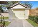 Detached single-car garage with light yellow siding at 230 Gordon St, Charleston, SC 29403