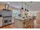 Modern kitchen with white cabinets, stainless steel appliances, and breakfast bar at 230 Gordon St, Charleston, SC 29403