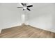 Bright bedroom featuring wood-look floors and ceiling fan at 2462 Swallow Dr, Charleston, SC 29414