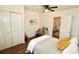 Cozy bedroom with closet, ceiling fan, and ensuite bathroom access at 2755 W W Surrey Dr, North Charleston, SC 29405