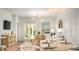 Open concept dining room with coastal decor and hardwood floors at 302 Tiliwa St, Summerville, SC 29486