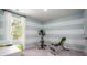 Dedicated home gym with exercise bike and weight bench at 302 Tiliwa St, Summerville, SC 29486