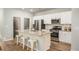 Modern kitchen with granite countertops and stainless steel appliances at 302 Tiliwa St, Summerville, SC 29486