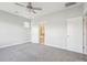 Bright bedroom with carpet, ceiling fan and bathroom access at 310 Parish Farms Dr, Summerville, SC 29486