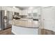 Modern kitchen with white cabinets and granite countertops at 310 Parish Farms Dr, Summerville, SC 29486