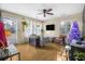 Living room with hardwood floors and a Christmas tree at 328 Sprucewood Dr, Summerville, SC 29485