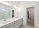 Bathroom with double vanity, quartz countertop and walk-in shower at 347 Trailmore Ln, Summerville, SC 29486