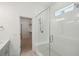 Bathroom with walk-in shower, built-in seat, and adjacent closet at 347 Trailmore Ln, Summerville, SC 29486