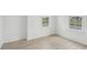 Spacious bedroom with hardwood floors and large windows at 347 Trailmore Ln, Summerville, SC 29486
