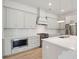 Modern kitchen with stainless steel appliances and white cabinets at 347 Trailmore Ln, Summerville, SC 29486