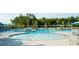 Large resort-style pool with multiple areas and lounge chairs at 347 Trailmore Ln, Summerville, SC 29486