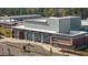 Aerial view of the Summers Corner Performing Arts Center, featuring brick and gray exterior, ample parking and landscaping at 356 Garden Lily Ln, Summerville, SC 29485