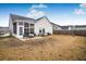 House with backyard patio, screened porch, and hammock at 356 Garden Lily Ln, Summerville, SC 29485