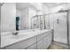 Bright bathroom with double vanity and walk-in shower at 356 Garden Lily Ln, Summerville, SC 29485