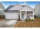 Charming one-story house with a front porch and attached garage at 356 Garden Lily Ln, Summerville, SC 29485