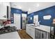 Modern kitchen with white cabinets and stainless steel appliances at 356 Garden Lily Ln, Summerville, SC 29485