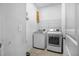 Laundry room with washer and dryer and shelving at 356 Garden Lily Ln, Summerville, SC 29485