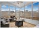 Relaxing sunroom featuring ample seating and fire pit at 356 Garden Lily Ln, Summerville, SC 29485