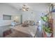 Living room with vaulted ceiling, a brick fireplace, plush carpeting, and hardwood floors at 408 Trailway Dr, Summerville, SC 29483