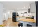 Modern kitchen with black appliances and wood counter at 4651 Oakwood Ave, North Charleston, SC 29405