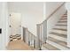 Modern staircase with light wood and black metal railings at 523 Reid St, Mount Pleasant, SC 29464