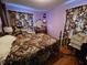 Cozy bedroom with a double bed and patterned bedding at 7024 E Constellation Dr, North Charleston, SC 29418