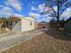 Side view of house with attached garage at 7024 E Constellation Dr, North Charleston, SC 29418