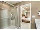 Bathroom with a large walk-in shower and view into bedroom at 749 Meadowbrook Ln, Summerville, SC 29486