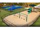 Community playground with swings, slides, and basketball court at 751 Meadowbrook Ln, Summerville, SC 29486