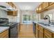 Kitchen with stainless steel appliances and wood cabinets at 1111 Alwyn Blvd, Summerville, SC 29485